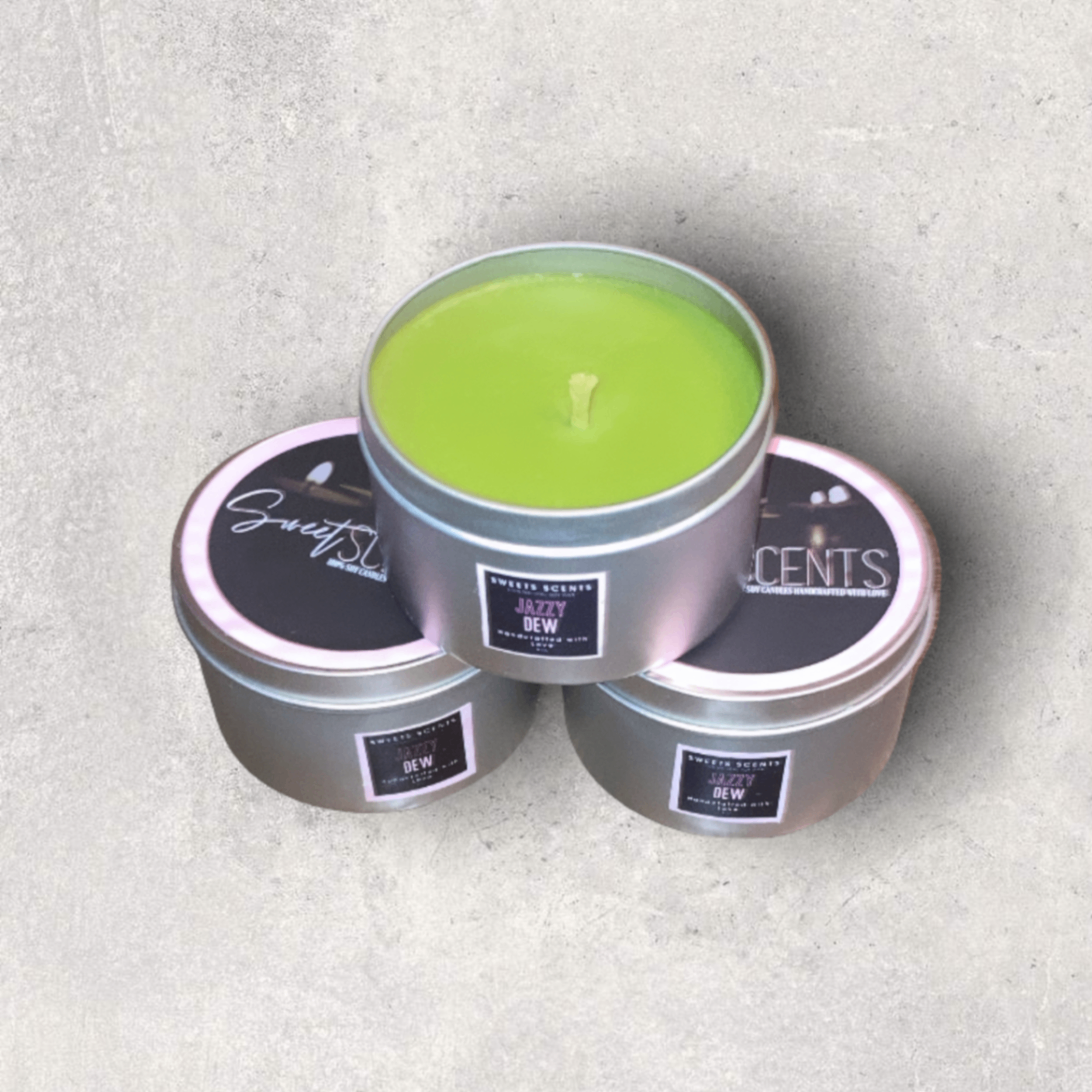 Jazzy Dew soy candle in a travel tin