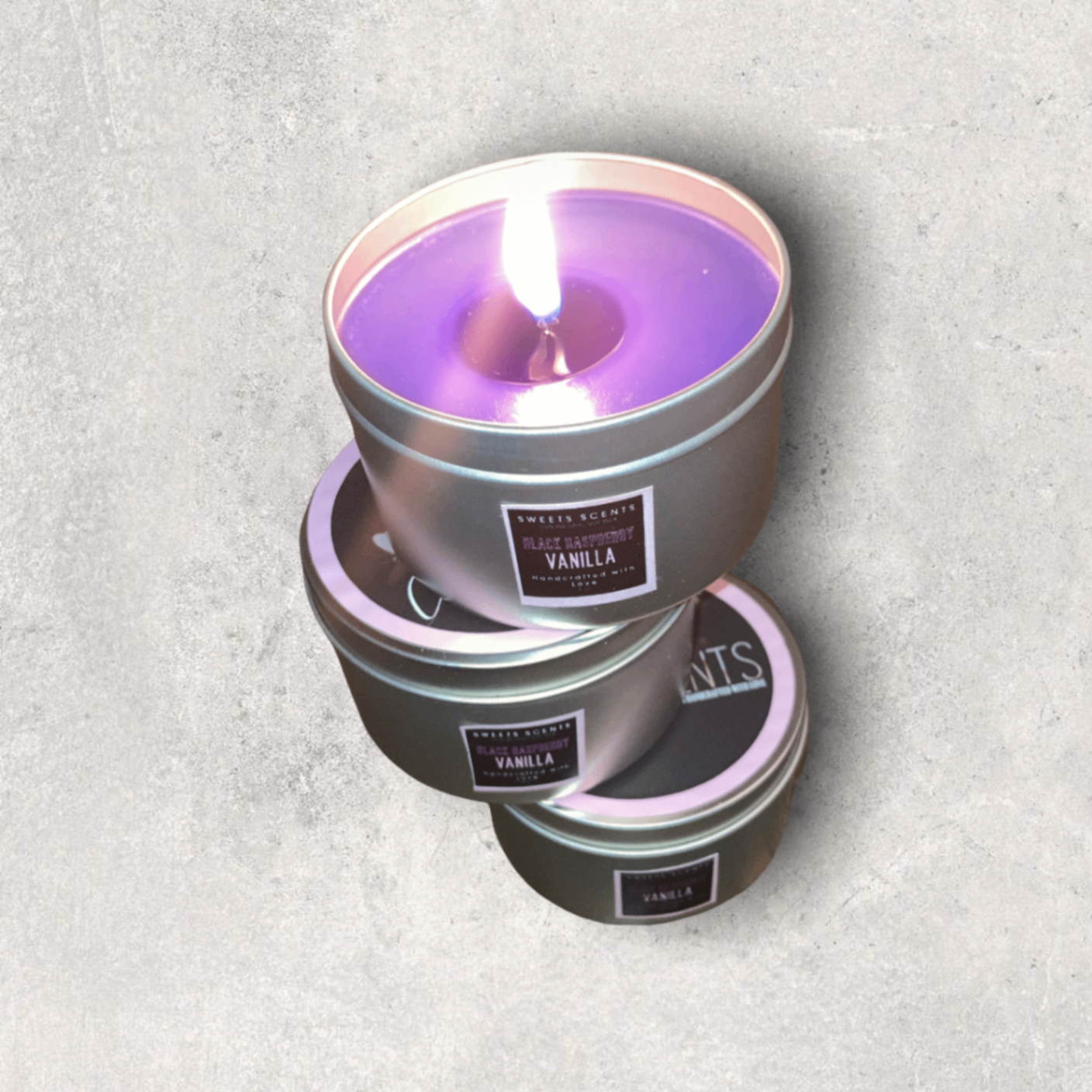 Black Raspberry Vanilla soy candle in a travel tin